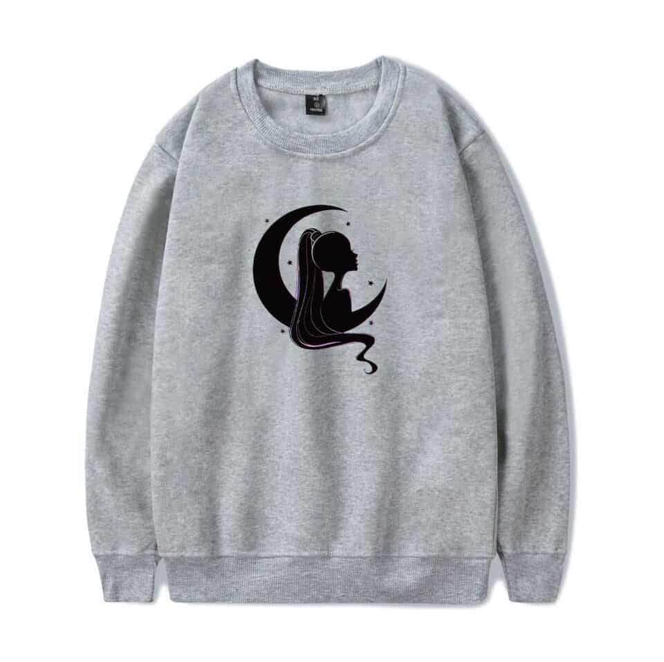 Ariana Grande merchandise sweatshirt with a black silhouette of a girl with long hair on a moon and stars print.