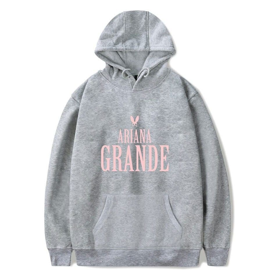 Ariana Grande hoodie with pink logo and text on grey sweatshirt.